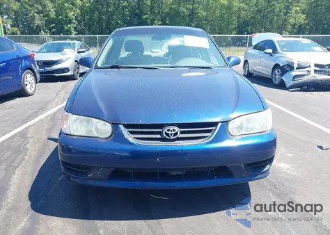 2002 Toyota Corolla Le из США, поврежденный, VIN 2T1BR12E52C558044